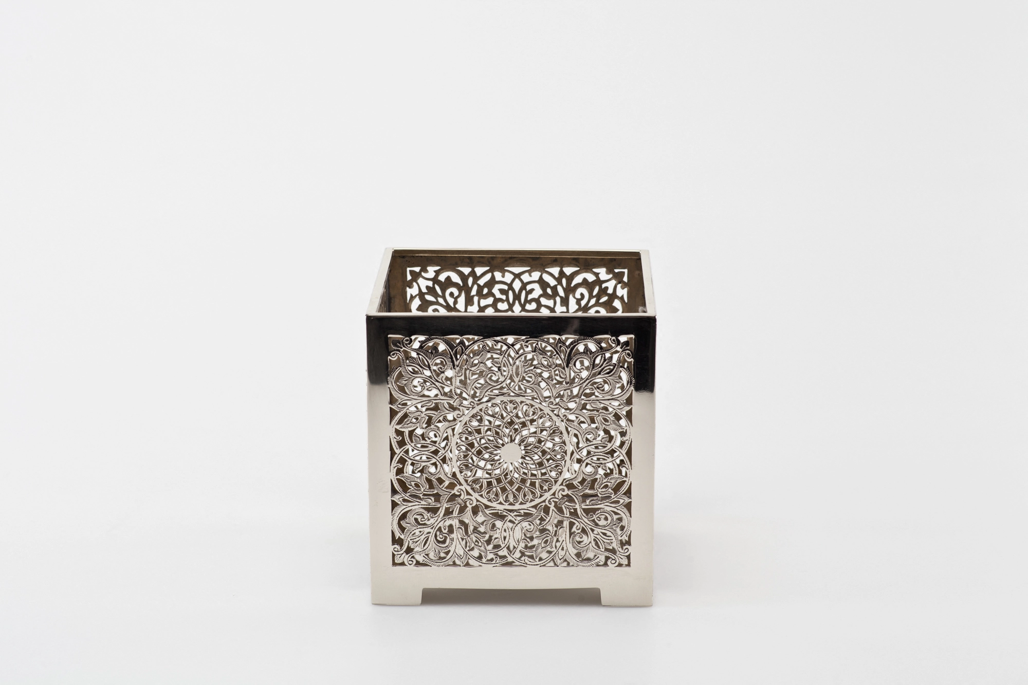 A square pierced metal candle box in a silver finish, photographed unlit against a white background.
